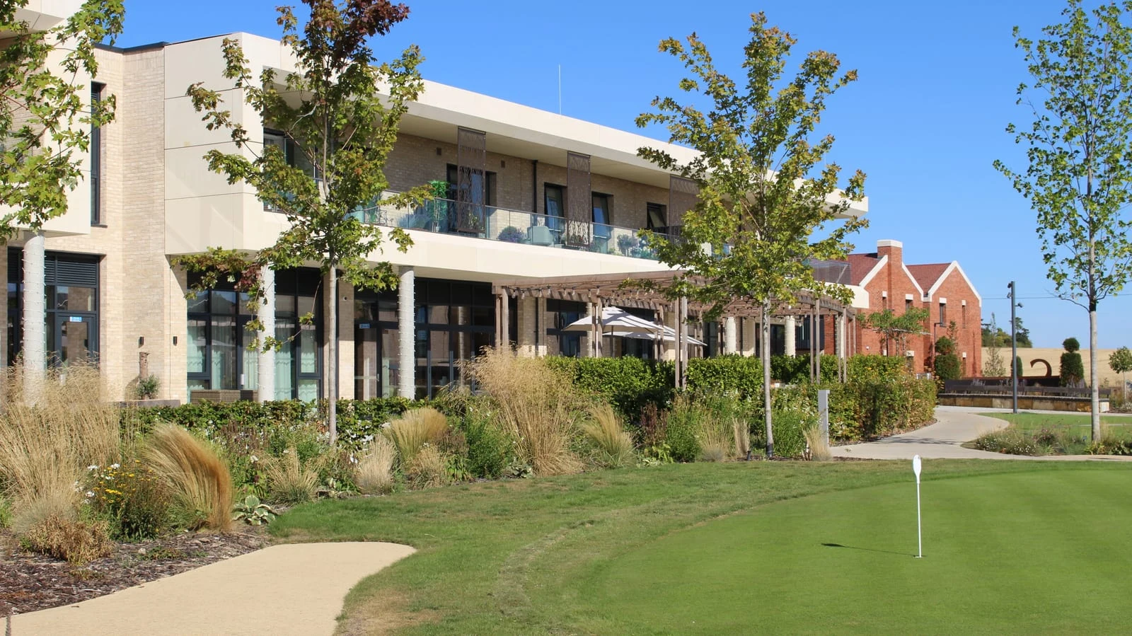 The pavilion seen across the green