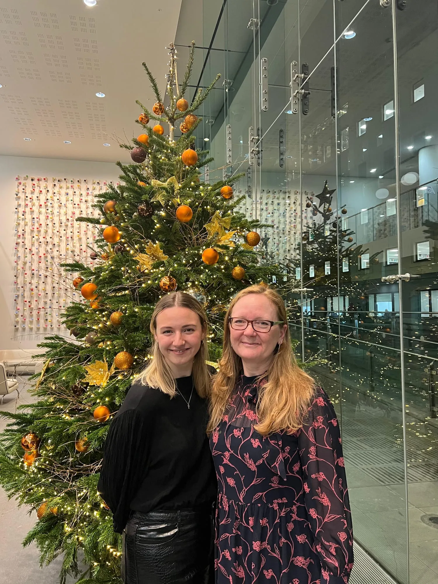 By the Christmas tree