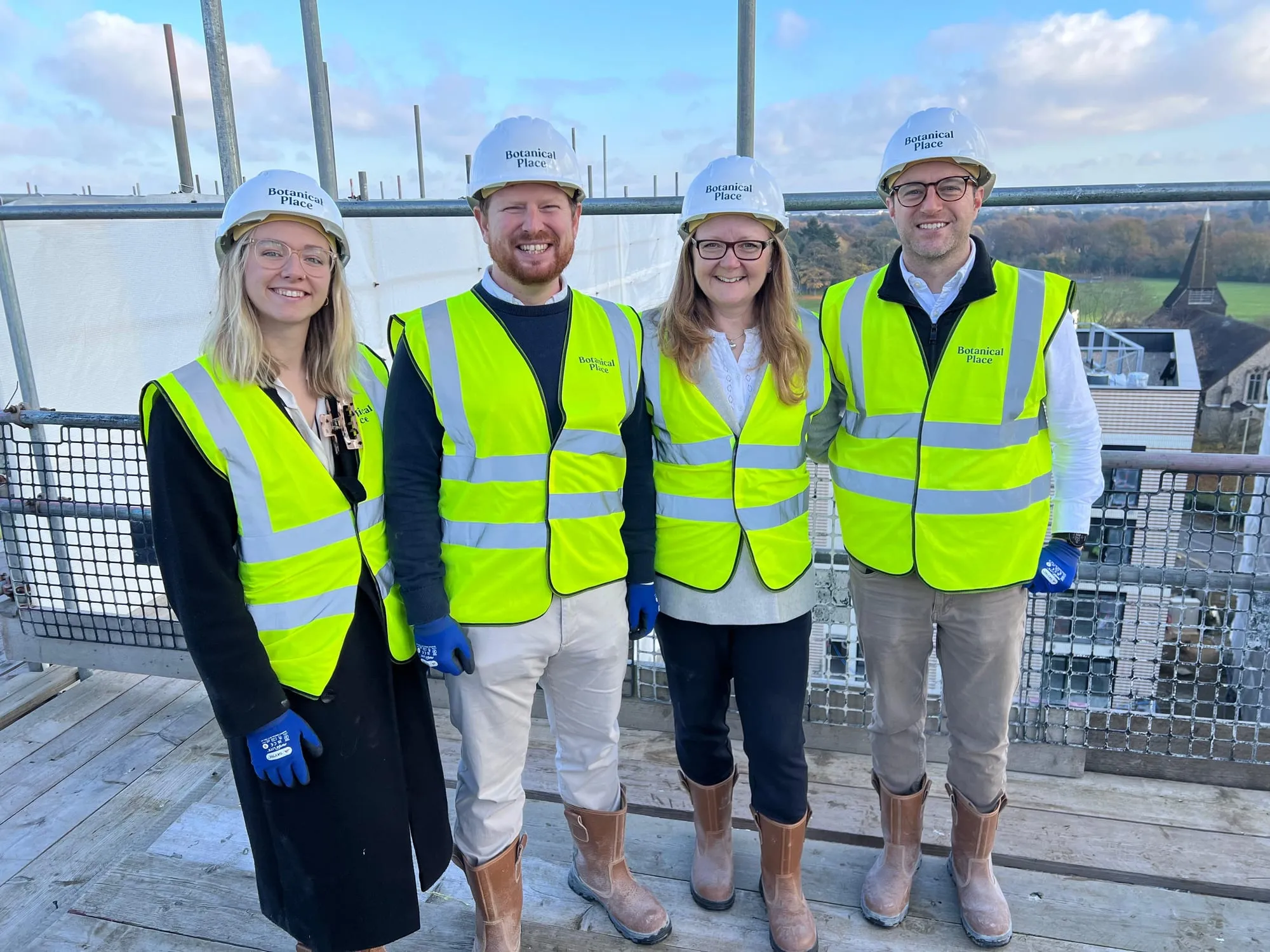 The team on a rooftop site visit