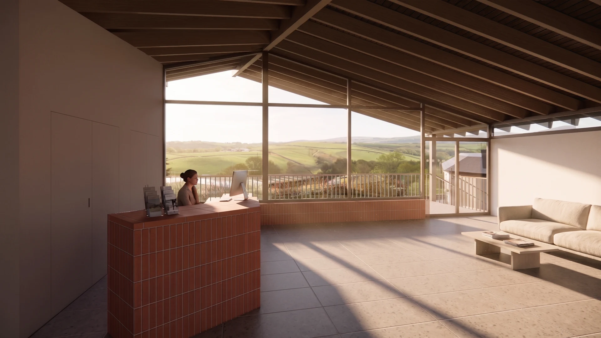Inside the reception: full-height glazing looks out over fields to Dartmoor, beneath an exposed timber roof